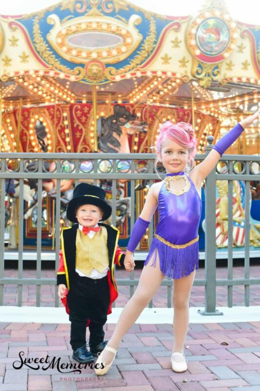 Halloween events in South Florida- two kids dressed up like characters from The Greatest Showman
